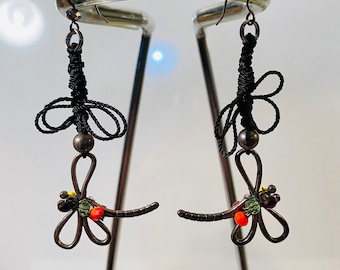 Black string dragon fly earrings