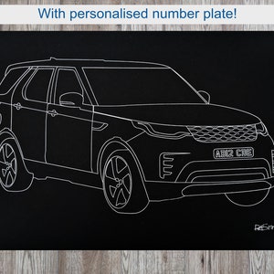 May include: A black and white line drawing of a sport utility vehicle (SUV) with the text "With personalised number plate!". The SUV has a personalized license plate that reads "AB12 CDE". The artwork is signed by "Pat Smith".
