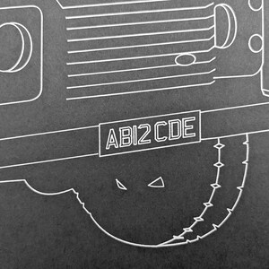 May include: Monochrome illustration of a mechanical component with a circular saw blade design. The image features the text "ABI2 CDE" in a rectangular box, and is set against a dark background.