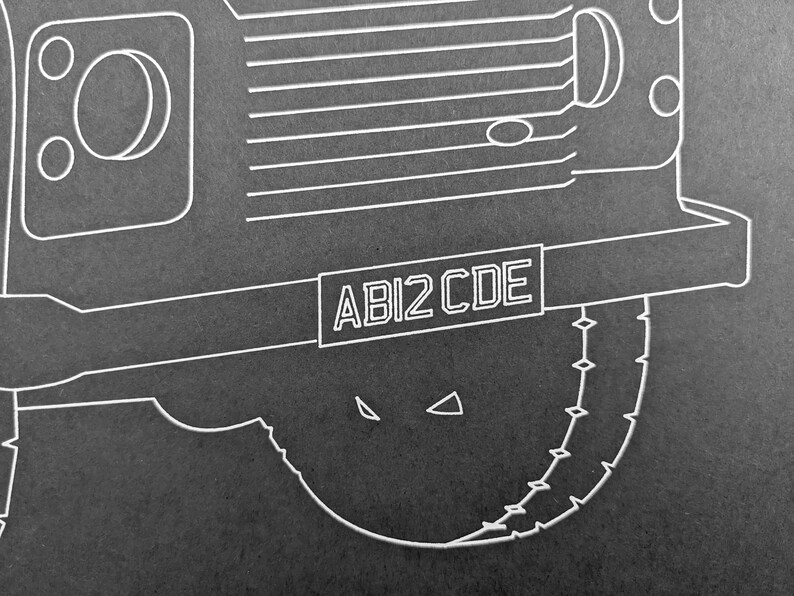 May include: Monochrome illustration of a mechanical component with a circular saw blade design. The image features the text "ABI2 CDE" in a rectangular box, and is set against a dark background.