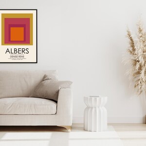 This Josef Albers Homage To The Square Print is a perfect Mother's Day gift or home decor item, featuring a vintage-inspired Exhibition Poster design and Nested Squares pattern. The bohemian style and geometric motif make it a great addition