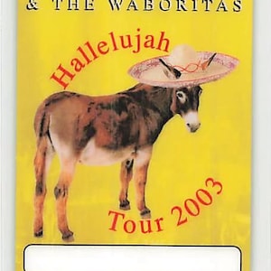 May include: A yellow tour pass with the text "SAMMY HAGAR & THE WABORITAS" and "Hallelujah Tour 2003". The pass features a brown donkey wearing a sombrero. The text "ON STAGE FUNATICS" is at the bottom.