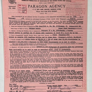 May include: A pink contract form for a musical engagement with the Paragon Agency. The contract is dated February 13, 1978, and is for a performance by the band Grinder Switch at Fat Cats in Miramar, Florida. The contract includes details about the performance dates, times, type of engagement, and payment terms.