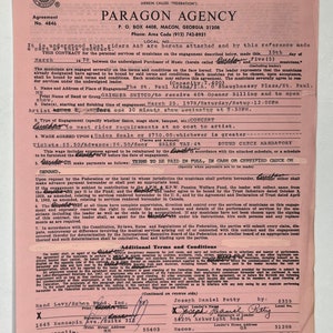 May include: A pink contract form for a musical engagement with the text "CONTRACT" at the top. The form is filled out with details about the engagement, including the date, location, and musicians involved. The form is signed by both the band and the booking agent.