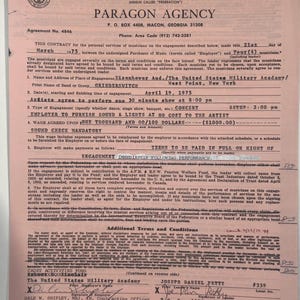 May include: A vintage contract from 1975, between Paragon Agency and Grinderswitch, for a concert at the United States Military Academy. The document is pink and features text, signatures, and a union seal.