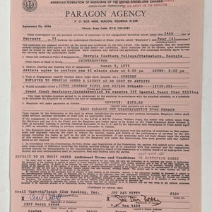May include: A vintage contract from Paragon Agency, dated February 14th, 1975, for a concert engagement. The document includes details about the band Grinderswitch, the venue, and financial terms. The contract is on aged paper with black ink.