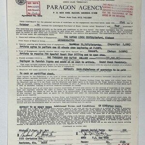 May include: A black and white contract form for musicians. The form is titled "Contract Blank" and is for the American Federation of Musicians of the United States and Canada. The form includes the name of the agency, Paragon Agency, and the date of the contract, October 21, 1975. The form also includes the names of the musicians, the leader, and the employer.