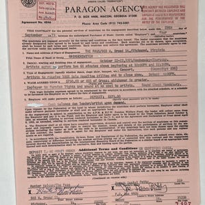 May include: A vintage contract from 1975, printed on pink paper, details an agreement between Paragon Agency and the band Grinderswitch for a concert. The document includes handwritten notes and signatures, with the band's name and venue address clearly visible.
