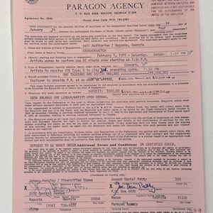 May include: A pink and white contract from Paragon Agency, dated January 1975, for a musical performance by Grinderswitch. The contract includes details about the engagement, wage, and payment terms.