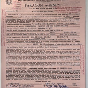 May include: A vintage contract from Paragon Agency, dated December 22, 1975, for a concert engagement. The document includes details about the band Grinderswitch, venue, and financial terms. The contract is signed by Richard Denton and Joseph Daniel Petty.