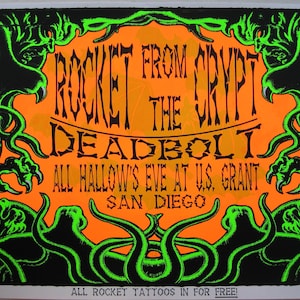 May include: A concert poster with a black and neon green design on an orange background. The text reads "ROCKET FROM CRYPT THE DEADBOLT ALL HALLOW'S EVE AT U.S. GRANT SAN DIEGO". The poster has a Halloween theme.