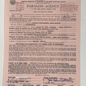 May include: A vintage contract from 1975 between Paragon Agency and a band for a concert. The document is on pink paper and includes details about the engagement, payment, and terms. The contract is signed by the band leader and the employer.