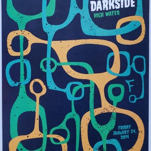 May include: A concert poster for the band Darkside, performing at The Fillmore in San Francisco on January 24, 2014. The poster features a colorful abstract design with green and orange shapes.