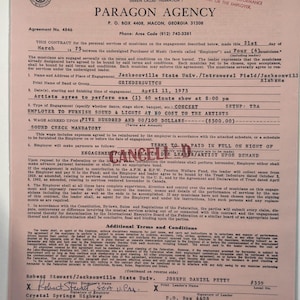 May include: A pink contract from Paragon Agency for a Grinderswitch concert at Jacksonville State Univ. on April 11, 1975. The document includes details about the musicians, wage, and terms, with signatures from Robert Stewart and Joseph Daniel Petty.