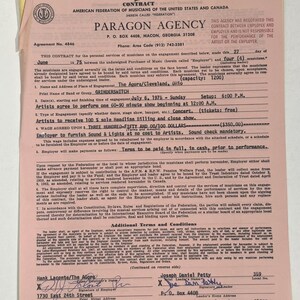 May include: A contract from the American Federation of Musicians, dated June 27, 1975, for a concert at The Agora in Cleveland, Ohio. The agreement is between Paragon Agency and the band Grinderswitch, specifying a 60-90 minute show.