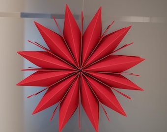 Christmas stars / star ornaments / folded stars made of colored cardstock / Christmas stars