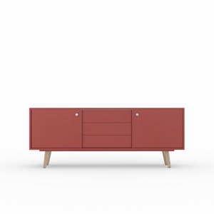 May include: A red wooden sideboard with two doors and three drawers. The sideboard has a modern design with simple lines and a light wood base.