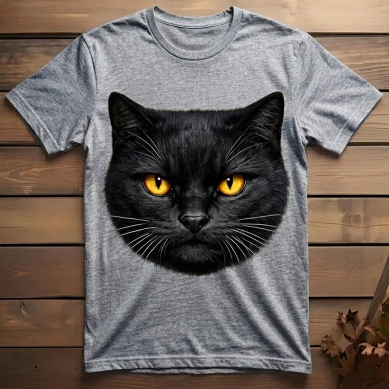 Striking graphic illustration of a fierce black cat with vibrant yellow eyes, perfect for edgy streetwear t-shirt designs and gothic apparel.