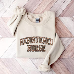 Registered Nurse Sweatshirt Nurse Gift for Nurse RN Crewneck Nursing School Sweater Nurse Life Healthcare Professional Student Nurse