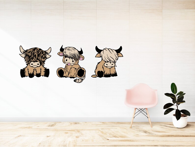 May include: Three cartoon Highland cow illustrations in brown and black with white accents. The cows are sitting and facing forward. The cows are on a white background.
