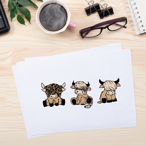 May include: Three cartoon Highland cows, each with a different expression, are sitting on a white background. The cows are brown with black hooves and noses. The cow on the left has brown fur, the middle cow has black and white fur, and the cow on the right has brown fur.