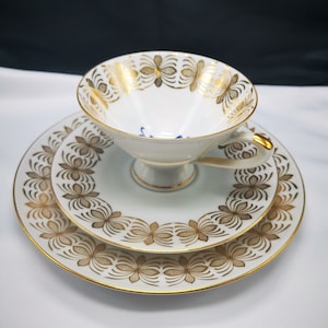 Vintage German Porcelain Tea-Coffee Cup and Dessert Plate Set: A Timeless and Cherished Collectible
