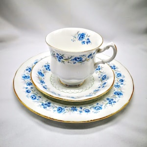Vintage Porcelain Tea and Coffee Set  from  By Royal Malvern, England: A Timeless Classic