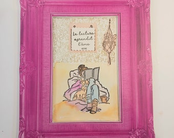 Table in the shape of a pink frame with scrapped card on the theme of reading