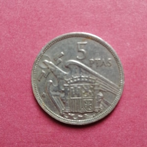 I sell 5 pesetas from 1957