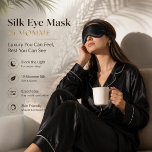 May include: A black silk eye mask with an adjustable strap, worn with black silk pyjamas featuring white piping. The text reads Silk Eye Mask, 19 MOMME, Luxury You Can Feel, Rest You Can See, Block the Light, 19 Momme Silk, Breathable, and Skin Friendly.