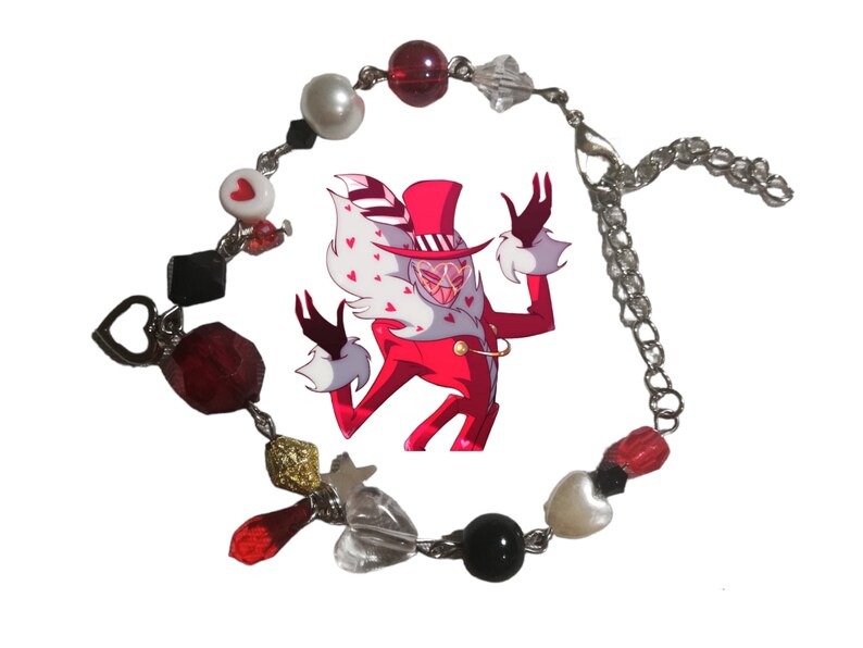May include: A red and white charm bracelet with a heart-shaped clasp. The bracelet features a variety of charms, including hearts, stars, and a character from the animated series "Hazbin Hotel".