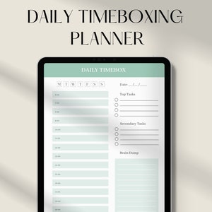 May include: A digital planner on a tablet with the text "DAILY TIMEBOXING PLANNER." The planner has a mint green and white design with sections for daily time slots, top tasks, secondary tasks, and a brain dump area. The days of the week are listed across the top.