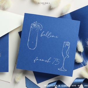 May include: A blue card with white text and illustrations of two cocktails. The text reads "Bellini" and "French 75".