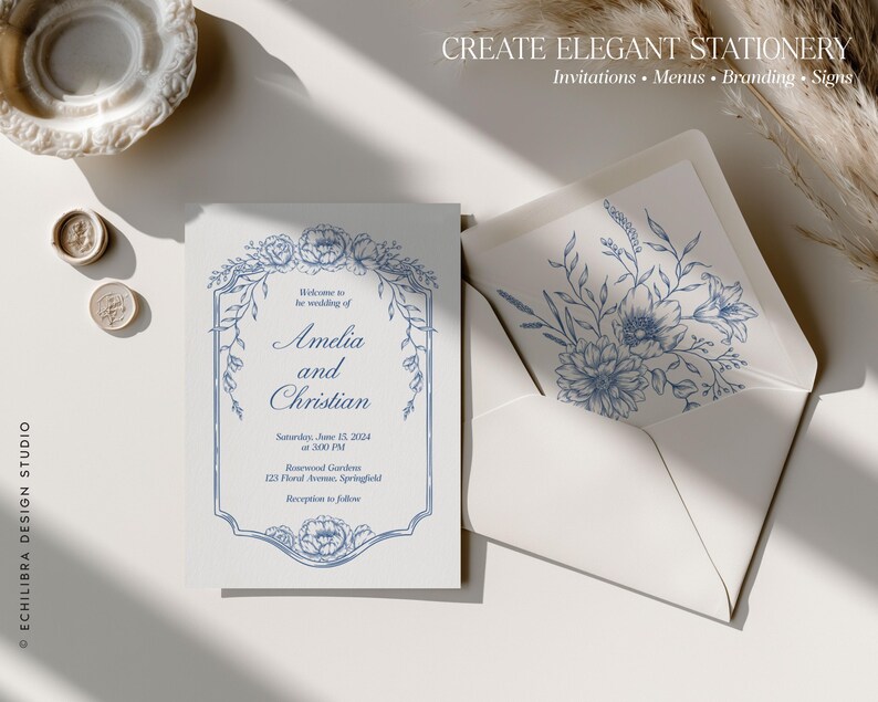 May include: A white wedding invitation card featuring blue floral illustrations and a decorative border, with the text Amelia and Christian, Saturday, June 15, 2024, at 3:00 PM, Rosewood Gardens, 123 Floral Avenue, Springfield. Includes a matching envelope.