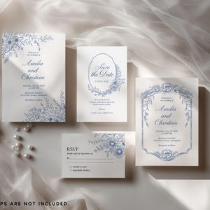 May include: A wedding stationery set featuring white cards with blue floral illustrations and elegant typography. The set includes an invitation, a save the date card, and an RSVP card, all decorated with intricate botanical line art in blue ink.