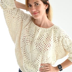 May include: A set of three ceramic mugs with a speckled, matte finish. Each mug features a different color: light blue, cream, and gray. The mugs have a simple, modern design and a comfortable handle.