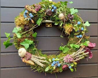 Autumn wreath lovingly handcrafted wreath made of natural materials, matching decoration for autumn. As a door wreath or table arrangement