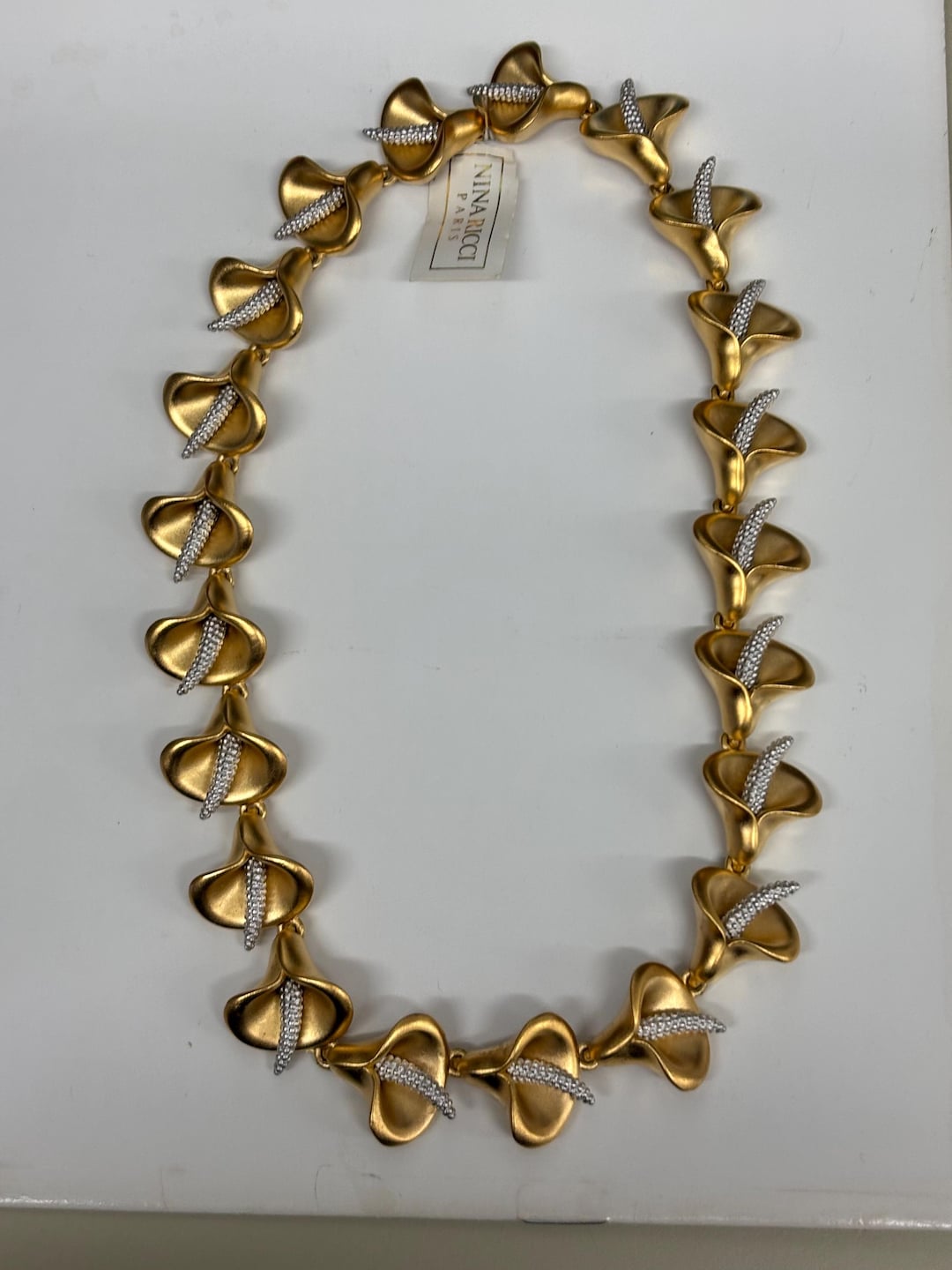 Nina Ricci Necklace, Triple 22kt Gold Plated Flower W Rhodium