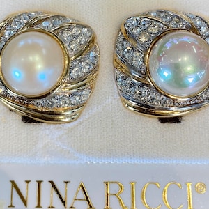 Nina Ricci Clip Earrings. Handset Swarovski crystals and centre pearl. Designer, Vintage, Canadian, NEW