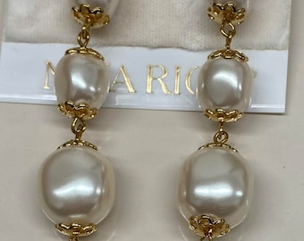 Nina Ricci Pierced Long Drop Earrings.  4 pearl Drops. 4 inches Long. Triple 22kt gold plated. Handset Pearls. Canadian, Designer, New