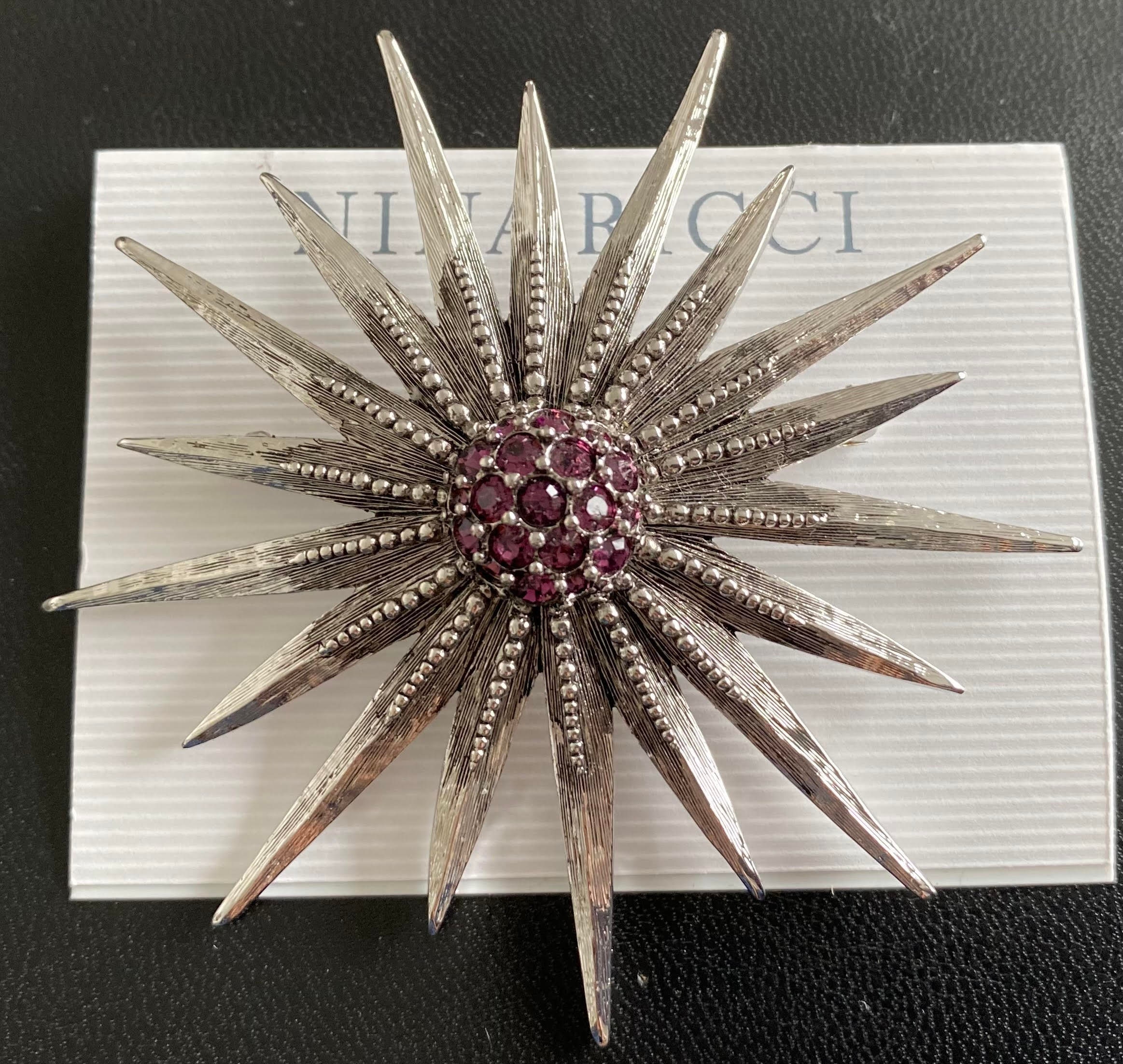 Vintage Nina Ricci Starburst Brooch, Swarovski Amethyst Crystals