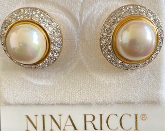 Nina Ricci Pierced Earring.  Triple 22kt gold plated w handset Swarovski crystals and pearl centre.  Designer, Vintage, Canadian, New pair