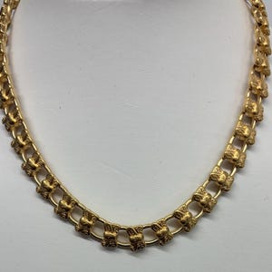 Nina Ricci Signature Halskette, Bögen mit Nina Ricci auf jedem Link, Euroverschluss, Dreifach 22kt vergoldet, Designer, Vintage, Kanadisch, Neu