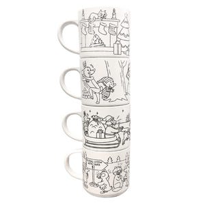 May include: Set of four white ceramic mugs stacked on top of each other. Each mug features a black and white illustration of a Christmas scene. The top mug shows a cat sitting on a fireplace mantle with stockings hanging from it. The second mug shows a reindeer and an elf in a snowy forest. The third mug shows Santa Claus in a sleigh with reindeer. The bottom mug shows a penguin and a cat in a snowy forest.