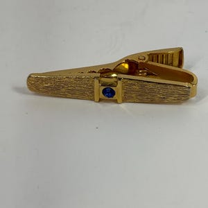 Vintage gold tone blue jewel tie clip