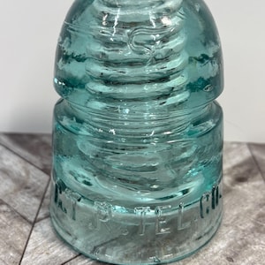 G.T.P tel co aqua blue glass insulator