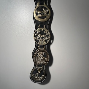 Set of 4 medallion horse brass