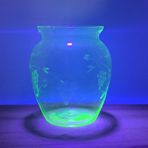 Vintage uranium glass, green glass, Vase with grape design, ruffled edge
