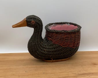 Vintage black wicker rattan duck planter with plastic insert