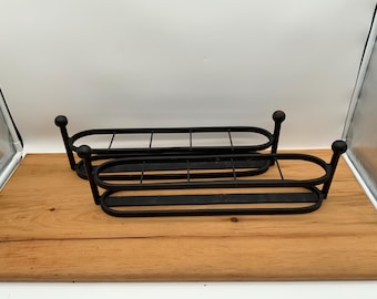 Vintage pair of black cast iron jar, candle or vase holders